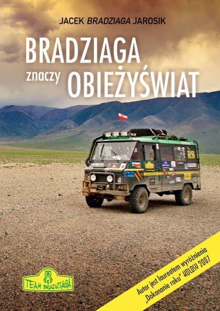 Wstęgą szos, miedzą pól złoconych, krętą ścieżką poprzez las