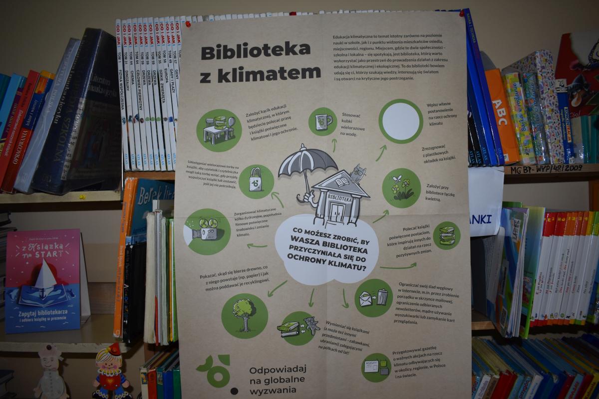 Plakat z napisem Biblioteka z klimatem